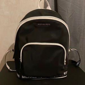 Michael Kors , small black/white bag pack, for men/women